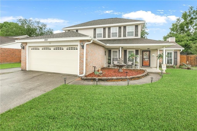 1927 Wyndemere Dr, Slidell, LA 70461 - view of front of property featuring concrete driveway, an attached garage, brick siding, a chimney, and a shingled roof