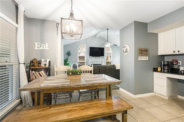 1927 Wyndemere Dr, Slidell, LA 70461 - dining area featuring light tile patterned floors, a ceiling fan, an office area, lofted ceiling, and a chandelier