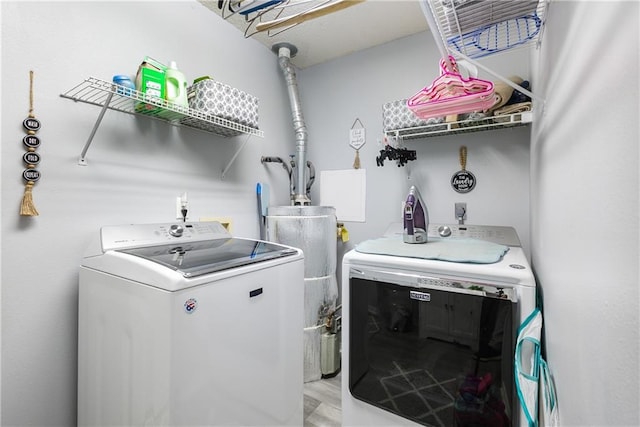 1927 Wyndemere Dr, Slidell, LA 70461 - laundry area featuring washing machine and clothes dryer and water heater
