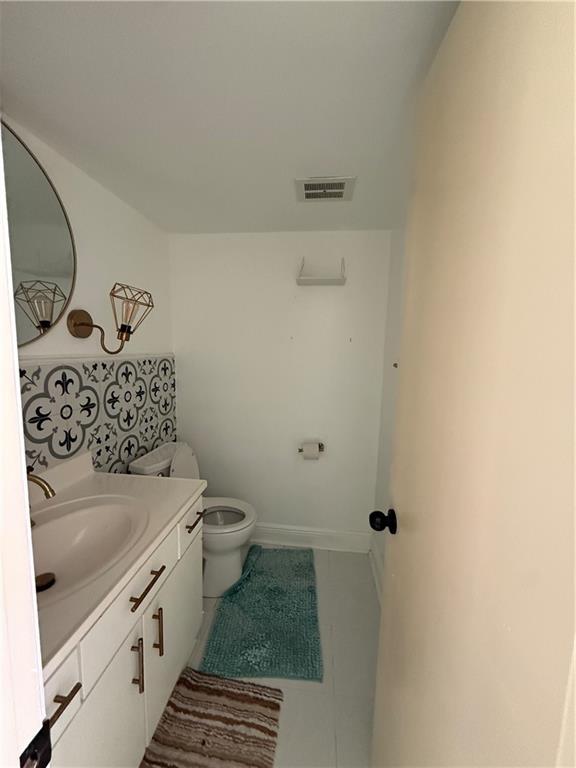 3757 Mimosa Ct, New Orleans, LA 70131 - half bath with vanity and tile patterned flooring