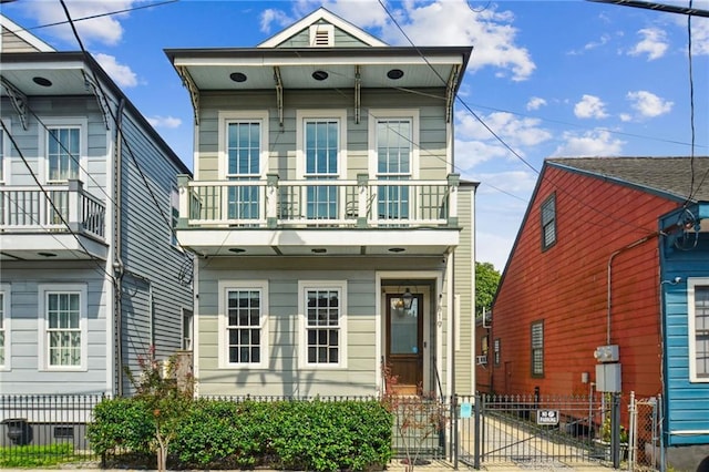 819 Franklin Ave, New Orleans, LA 70117 - shotgun-style home featuring a gate and a balcony