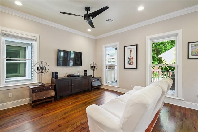 819 Franklin Ave, New Orleans, LA 70117 - living area with healthy amount of natural light, crown molding, ceiling fan, dark wood-style floors, and recessed lighting