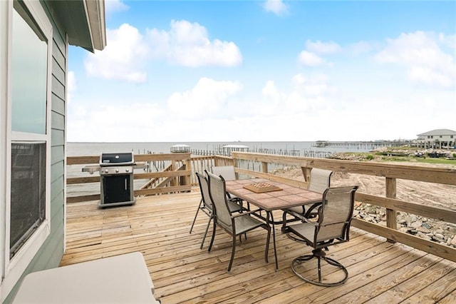 271 Lakeview Dr, Slidell, LA 70458 - wooden deck with a water view, outdoor dining space, and grilling area