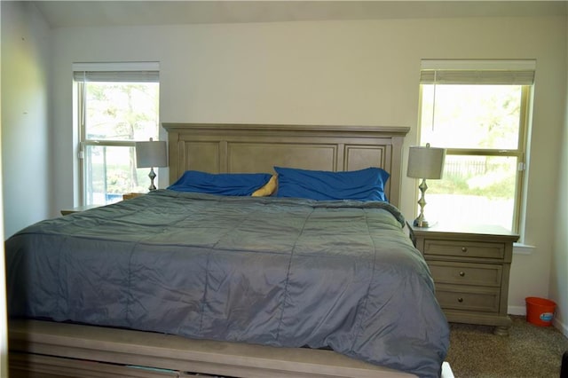47410 Johns Cv, Robert, LA 70455 - bedroom with carpet flooring and baseboards