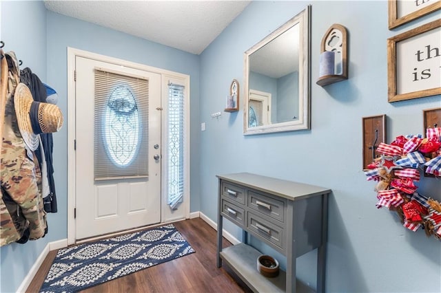 1799 Kings Row, Slidell, LA 70461 - entrance foyer with dark wood-style flooring, healthy amount of natural light, and a textured ceiling