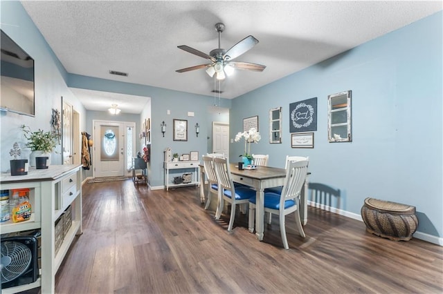 1799 Kings Row, Slidell, LA 70461 - dining area featuring ceiling fan, dark wood-style floors, and a textured ceiling