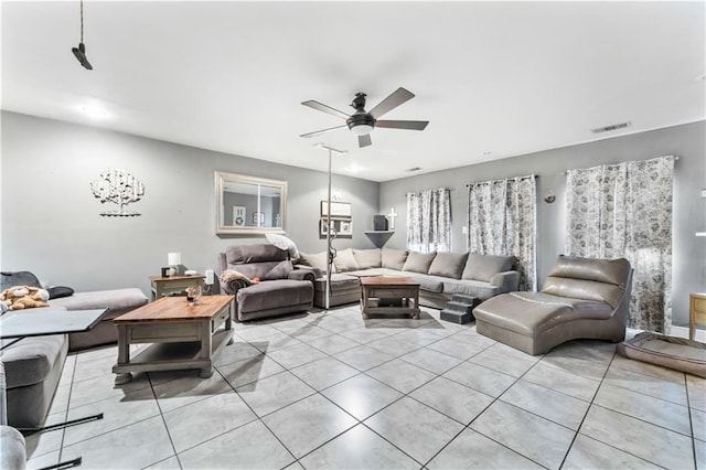 1799 Kings Row, Slidell, LA 70461 - living room featuring light tile patterned floors and a ceiling fan