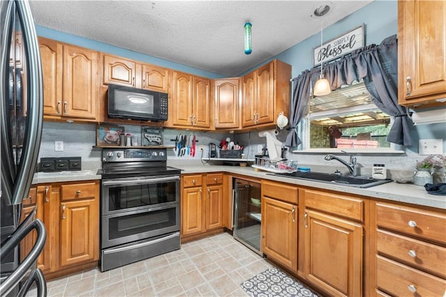 1799 Kings Row, Slidell, LA 70461 - kitchen featuring black appliances, wine cooler, backsplash, light countertops, and a textured ceiling