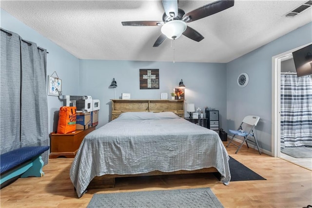 1799 Kings Row, Slidell, LA 70461 - bedroom with wood finished floors, a textured ceiling, and ceiling fan