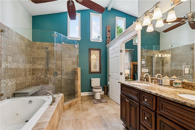 6744 Canal Blvd, New Orleans, LA 70124 - bathroom with ceiling fan, a stall shower, a jetted tub, double vanity, and tile patterned flooring