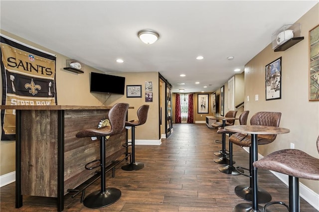 6744 Canal Blvd, New Orleans, LA 70124 - indoor dry bar with dark wood-type flooring and recessed lighting