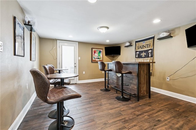 6744 Canal Blvd, New Orleans, LA 70124 - workout room featuring a bar, dark wood-style flooring, and recessed lighting