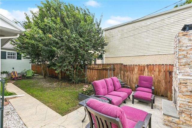 6744 Canal Blvd, New Orleans, LA 70124 - fenced backyard with an outdoor hangout area and a patio area