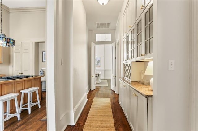 3325 Coliseum St, New Orleans, LA 70115 - corridor featuring dark wood-style flooring