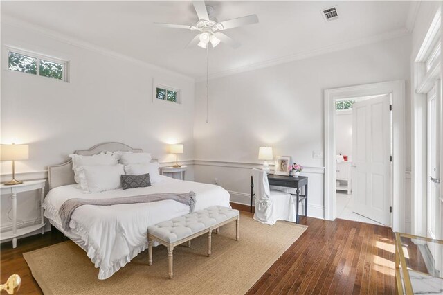 3325 Coliseum St, New Orleans, LA 70115 - bedroom featuring multiple windows, crown molding, hardwood / wood-style floors, and a ceiling fan
