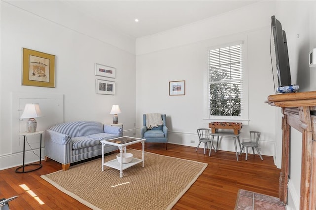 3325 Coliseum St, New Orleans, LA 70115 - living area featuring wood finished floors and baseboards