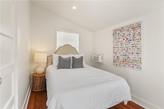 3325 Coliseum St, New Orleans, LA 70115 - bedroom with lofted ceiling, wood finished floors, an AC wall unit, and recessed lighting