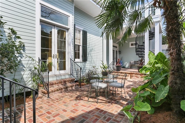3325 Coliseum St, New Orleans, LA 70115 - view of patio featuring french doors, entry steps, and stairs