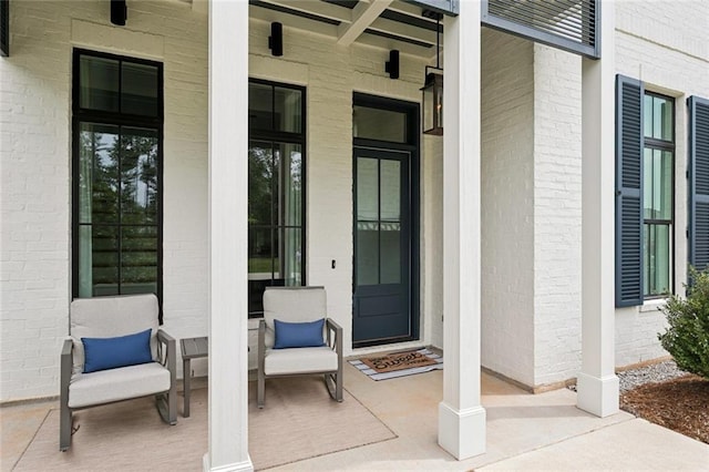 1185 Delta Ln, Covington, LA 70433 - entrance to property featuring a porch and brick siding