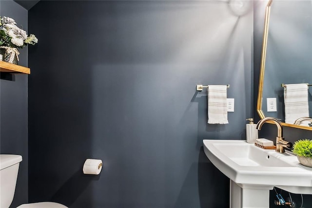 1185 Delta Ln, Covington, LA 70433 - half bath featuring toilet and a sink