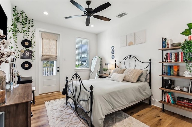 1185 Delta Ln, Covington, LA 70433 - bedroom with light wood-type flooring, recessed lighting, and a ceiling fan