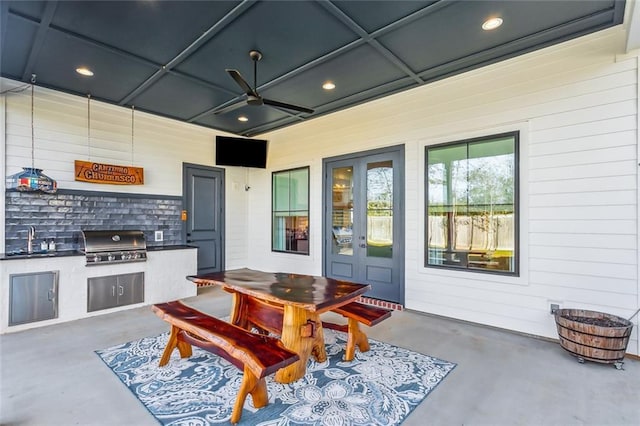 1185 Delta Ln, Covington, LA 70433 - view of patio featuring area for grilling, ceiling fan, and outdoor dining area
