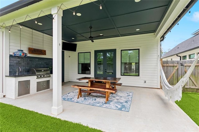 1185 Delta Ln, Covington, LA 70433 - view of patio featuring exterior kitchen, french doors, and a ceiling fan