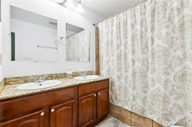 2517 Myrtle St, New Orleans, LA 70122 - full bathroom with double vanity and curtained shower