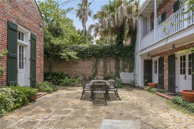 1124 Barracks St, New Orleans, LA 70116 - view of patio featuring outdoor dining area