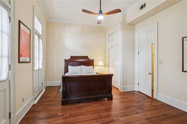 1124 Barracks St, New Orleans, LA 70116 - bedroom with crown molding, wood finished floors, and a ceiling fan