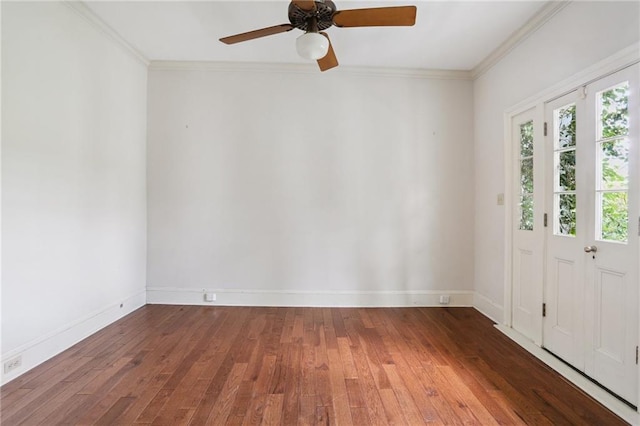 1124 Barracks St, New Orleans, LA 70116 - unfurnished room featuring hardwood / wood-style flooring, ceiling fan, and crown molding