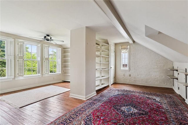 1124 Barracks St, New Orleans, LA 70116 - additional living space featuring wood finished floors, brick wall, and a ceiling fan