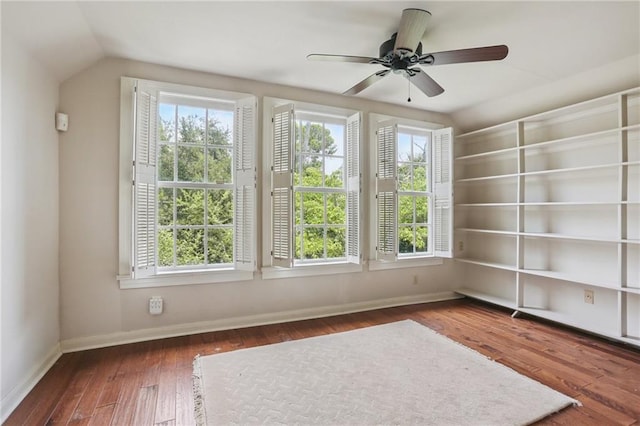 1124 Barracks St, New Orleans, LA 70116 - unfurnished room featuring wood-type flooring, vaulted ceiling, healthy amount of natural light, and ceiling fan