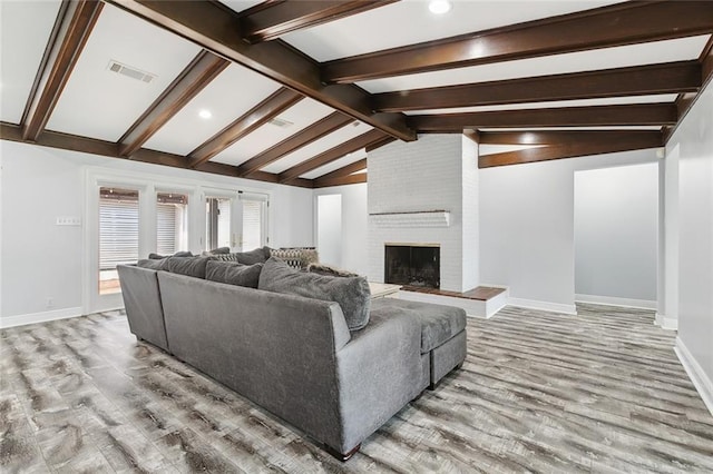 4400 Cleveland Pl, Metairie, LA 70003 - living area with wood finished floors, recessed lighting, and a fireplace