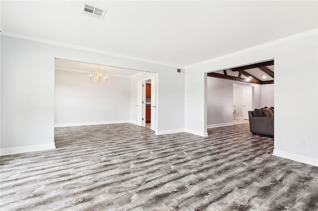 4400 Cleveland Pl, Metairie, LA 70003 - empty room featuring wood finished floors, a chandelier, and crown molding