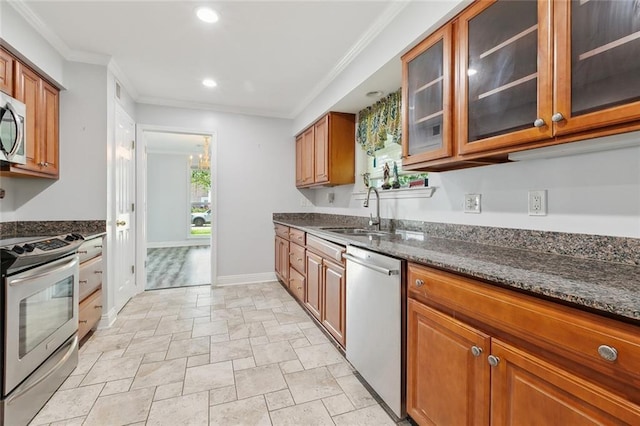 4400 Cleveland Pl, Metairie, LA 70003 - kitchen featuring appliances with stainless steel finishes, brown cabinets, dark stone counters, stone tile floors, and glass insert cabinets