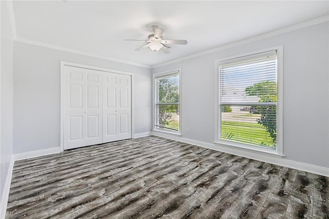 4400 Cleveland Pl, Metairie, LA 70003 - unfurnished bedroom with a closet, wood finished floors, crown molding, and ceiling fan