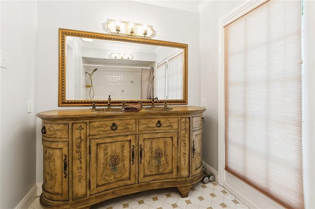 4400 Cleveland Pl, Metairie, LA 70003 - bathroom with a shower, vanity, and crown molding
