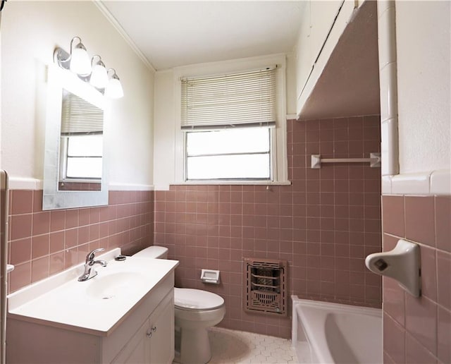 30507 Labarre Dr, Metairie, LA 70001 - bathroom with heating unit, tile walls, vanity, wainscoting, and tile patterned floors
