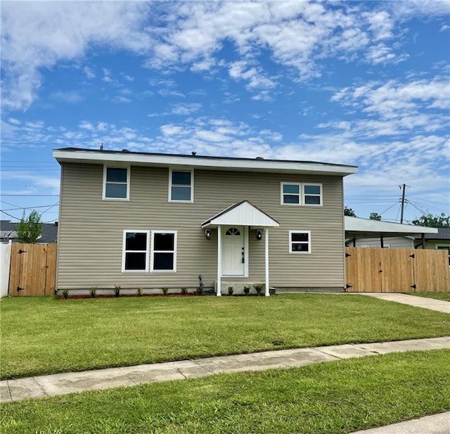 144 Yvonne Dr, Avondale, LA 70094 - traditional home featuring a gate, driveway, and a carport