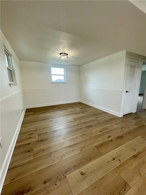 144 Yvonne Dr, Avondale, LA 70094 - empty room with hardwood / wood-style flooring and a wainscoted wall