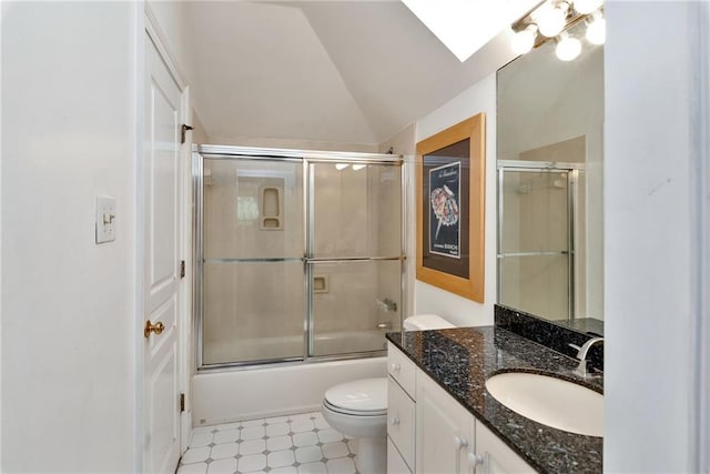 15 Muirfield Pl, New Orleans, LA 70131 - bathroom with vanity, tile patterned floors, lofted ceiling, enclosed tub / shower combo, and a skylight