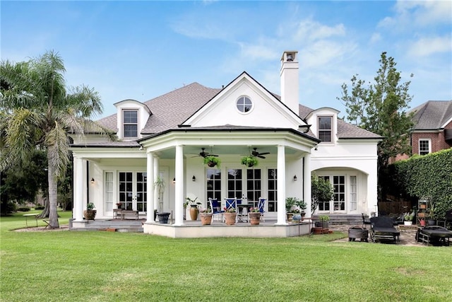 15 Muirfield Pl, New Orleans, LA 70131 - back of property featuring a yard, ceiling fan, french doors, a chimney, and roof with shingles