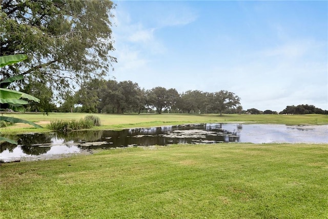 15 Muirfield Pl, New Orleans, LA 70131 - dock area with a water view and a yard