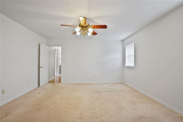 4152 Cognac Dr, Kenner, LA 70065 - unfurnished room featuring light carpet, ceiling fan, and a textured ceiling
