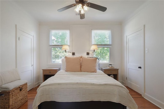 4717 Orleans Blvd, Jefferson, LA 70121 - bedroom with multiple windows, light wood-style flooring, and a ceiling fan