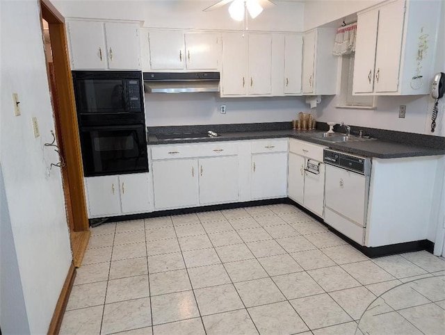 1116 Carnation Ave, Metairie, LA 70001 - kitchen with black appliances, under cabinet range hood, dark countertops, and white cabinetry