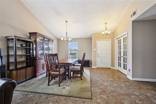 1702 Barrymore St, Slidell, LA 70461 - dining space featuring a chandelier and a textured ceiling