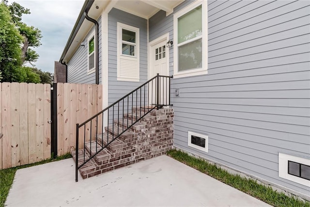 8532 Regiment Dr, Chalmette, LA 70043 - view of exterior entry with a patio area