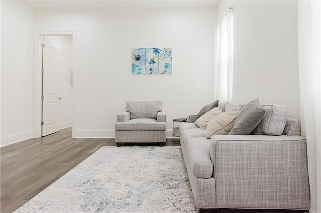 8532 Regiment Dr, Chalmette, LA 70043 - living area featuring wood finished floors and baseboards